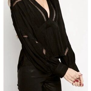 IRO
Bahari lace-trimmed crepe de chine blouse